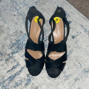 Women’s black strapped heels, genuine leather, only worn once.